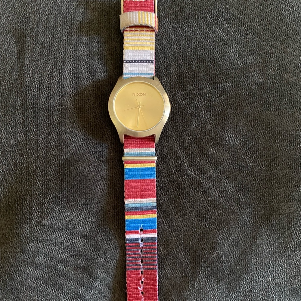 Multi color Nixon watch. Unisex. Fabric band.